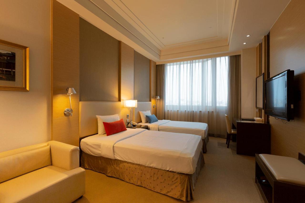Ever Delightful Business Hotel Цзяи Экстерьер фото